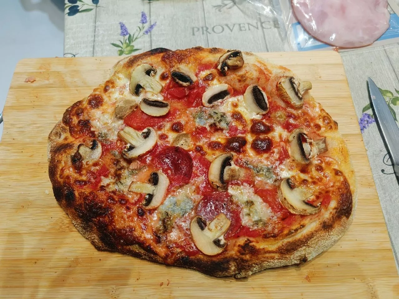 Pepperoni, mushroom and blue cheese pizza baked on a Steel Craft baking steel